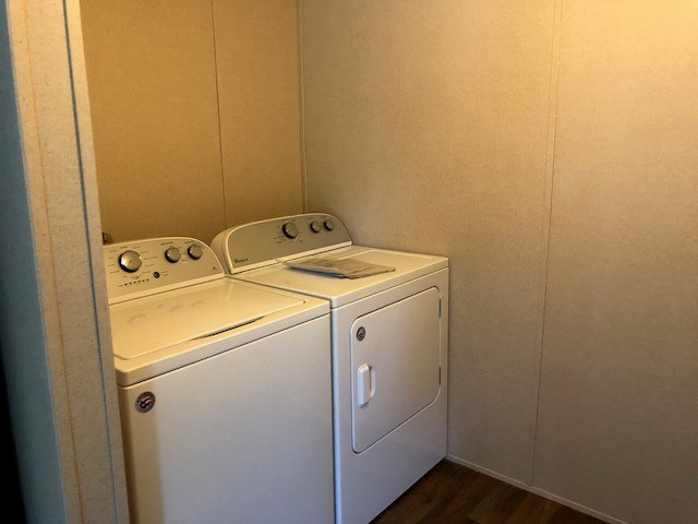 indoor laundry room with washer and dryer