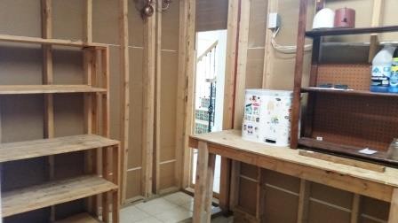 workshop hidden workshop with a secret door to access from inside the home