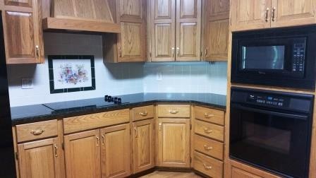 kitchen built in cook top and ovens make this gourmet kitchen a must see!